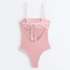 Bañador bandeau con ribete en contraste