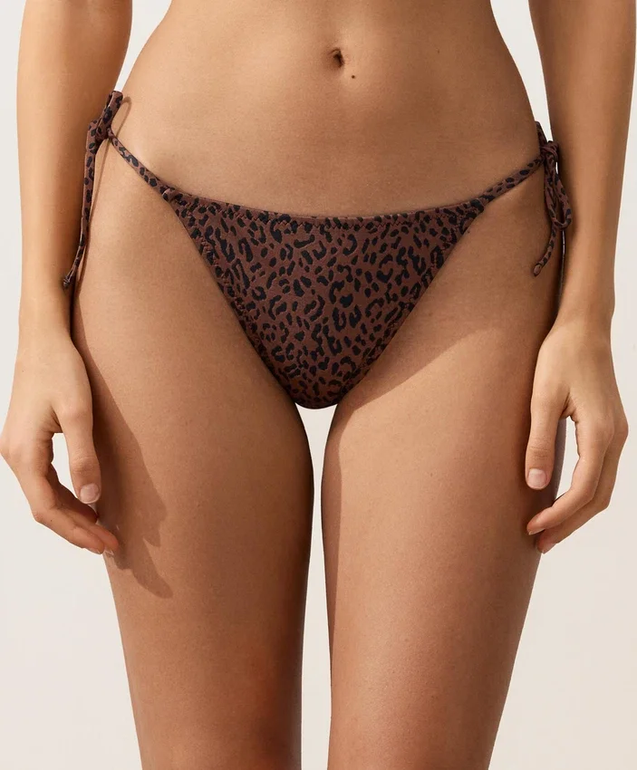 Braguitas de bikini de cobertura media con lazo y estampado de leopardo Braguitas de bikini de cobertura media con lazo y estampado de leopardo
