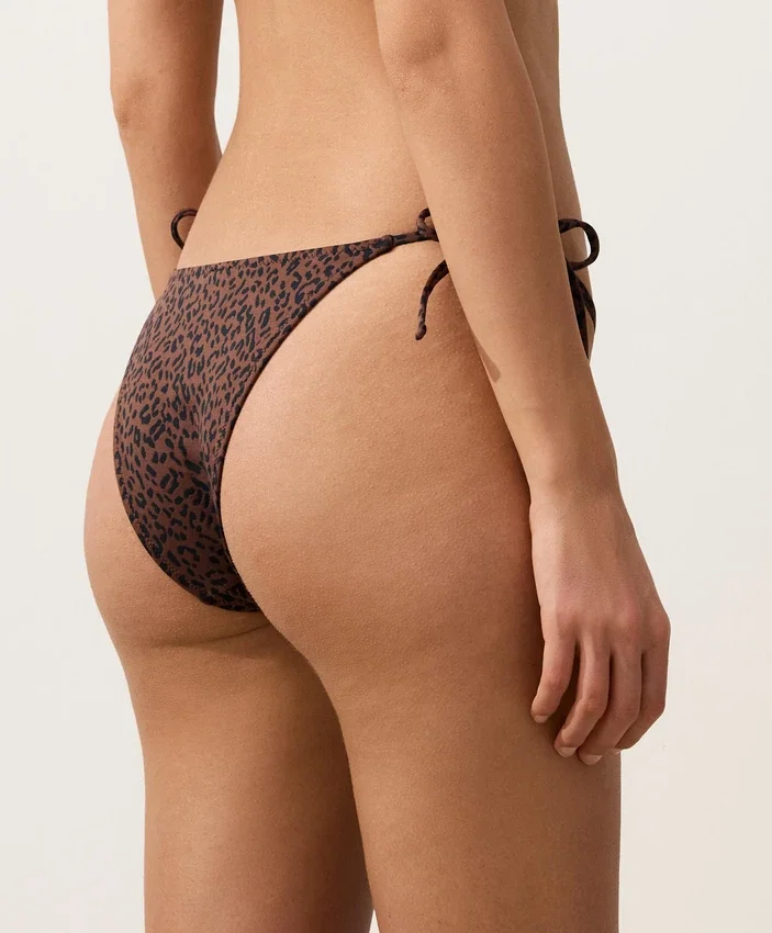 Braguitas de bikini de cobertura media con lazo y estampado de leopardo Braguitas de bikini de cobertura media con lazo y estampado de leopardo