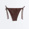 Braguitas de bikini de cobertura media con lazo y estampado de leopardo Braguitas de bikini de cobertura media con lazo y estampado de leopardo