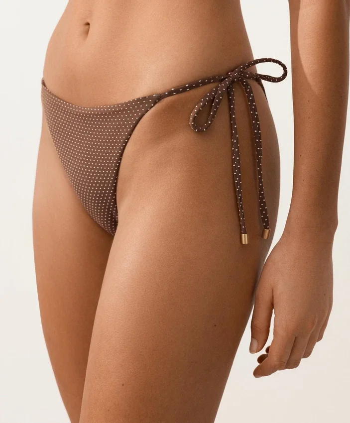 Braguitas de bikini de cobertura media con lazo y estampado de lunares pequeños Braguitas de bikini de cobertura media con lazo y estampado de lunares pequeños