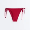 Braguitas de bikini de cobertura media con tejido de gofre y lazos Braguitas de bikini de cobertura media con tejido de gofre y lazos