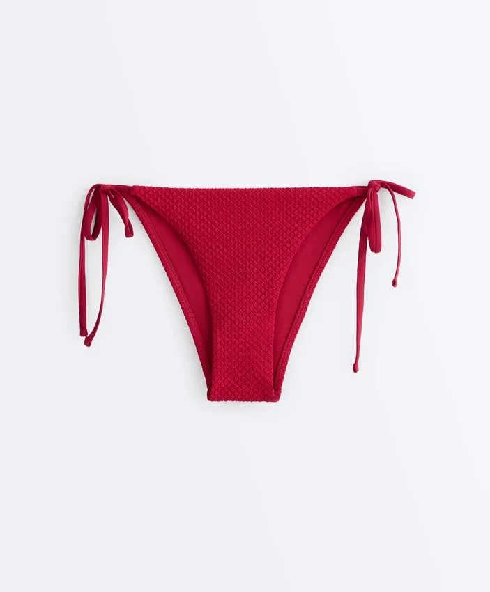 Braguitas de bikini de cobertura media con tejido de gofre y lazos Braguitas de bikini de cobertura media con tejido de gofre y lazos