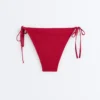 Braguitas de bikini de cobertura media con tejido de gofre y lazos Braguitas de bikini de cobertura media con tejido de gofre y lazos
