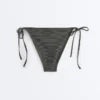 Braguitas de bikinis de cobertura media con lazos en jacquard con efecto lavado Braguitas de bikinis de cobertura media con lazos en jacquard con efecto lavado