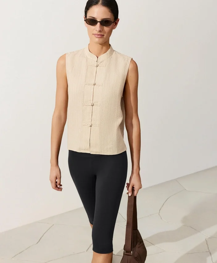 Camisas sin mangas de 100 % lino con cuello alto y botones Camisas sin mangas de 100 % lino con cuello alto y botones