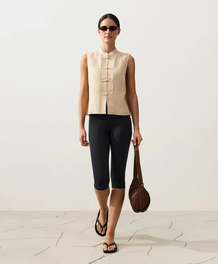 Camisas sin mangas de 100 % lino con cuello alto y botones Camisas sin mangas de 100 % lino con cuello alto y botones