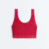 Camiseta corta de punto lavado con tirantes trenzados Camiseta corta de punto lavado con tirantes trenzados