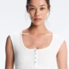 Camiseta sin mangas de punto elástico con botones de algodón y modal Camiseta sin mangas de punto elástico con botones de algodón y modal