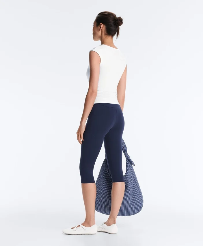 Camiseta sin mangas de punto elástico con botones de algodón y modal Camiseta sin mangas de punto elástico con botones de algodón y modal
