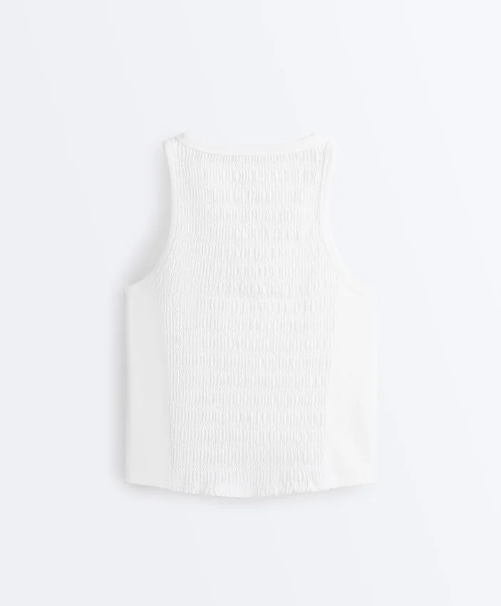 Camiseta sin mangas sin costuras con fruncidos Camiseta sin mangas sin costuras con fruncidos