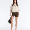 Chaqueta a rayas con bajo fruncido Chaqueta a rayas con bajo fruncido