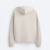 Chaqueta con capucha y detalles acanalados en modal cepillado Chaqueta con capucha y detalles acanalados en modal cepillado
