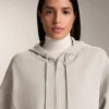 Chaqueta con capucha y detalles acanalados en modal cepillado Chaqueta con capucha y detalles acanalados en modal cepillado