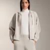 Chaqueta con capucha y detalles acanalados en modal cepillado Chaqueta con capucha y detalles acanalados en modal cepillado