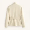 Chaqueta con efecto neopreno y cinturón Chaqueta con efecto neopreno y cinturón