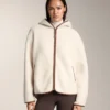 Chaqueta de imitación de piel de oveja con capucha Chaqueta de imitación de piel de oveja con capucha