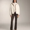 Chaqueta de imitación de piel de oveja con capucha Chaqueta de imitación de piel de oveja con capucha