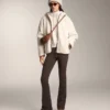Chaqueta de imitación de piel de oveja con capucha Chaqueta de imitación de piel de oveja con capucha