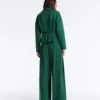 Pantalones de piqué de algodón de pierna ancha con pliegues