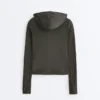 Chaqueta de punto de corte entallado con capucha Chaqueta de punto de corte entallado con capucha