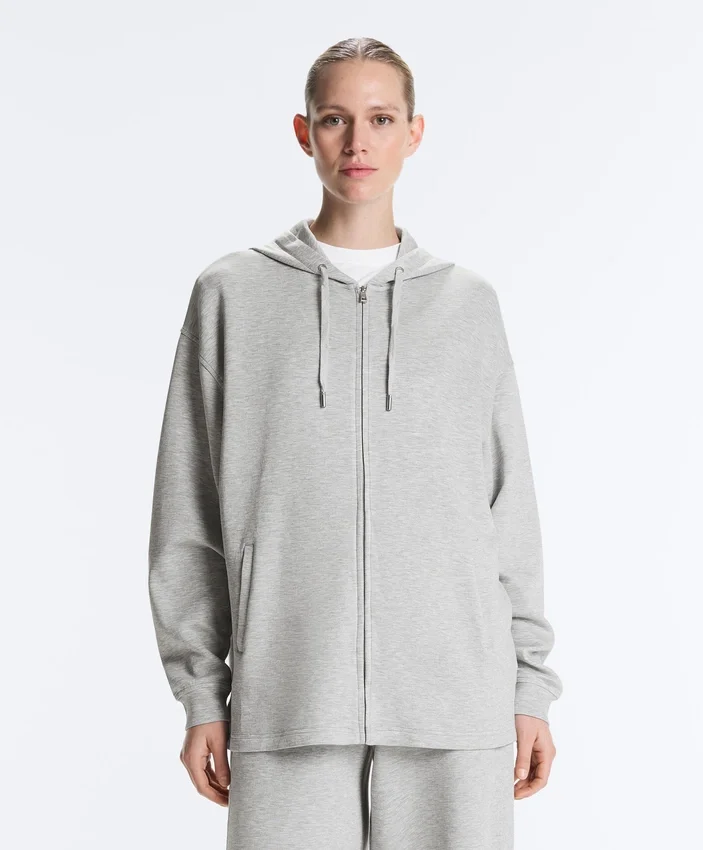 Chaqueta larga con capucha de piqué jaspeado Chaqueta larga con capucha de piqué jaspeado