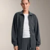 Chaqueta larga con rayas asimétricas y modal Chaqueta larga con rayas asimétricas y modal