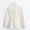 Chaqueta larga de estilo utilitario con cinturón de sarga Chaqueta larga de estilo utilitario con cinturón de sarga