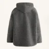 Chaqueta oversize de imitación de piel de oveja con capucha forrada de pelo sintético