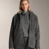 Chaqueta oversize de imitación de piel de oveja con capucha forrada de pelo sintético