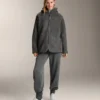 Chaqueta oversize de imitación de piel de oveja con capucha forrada de pelo sintético