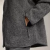 Chaqueta oversize de imitación de piel de oveja con capucha forrada de pelo sintético