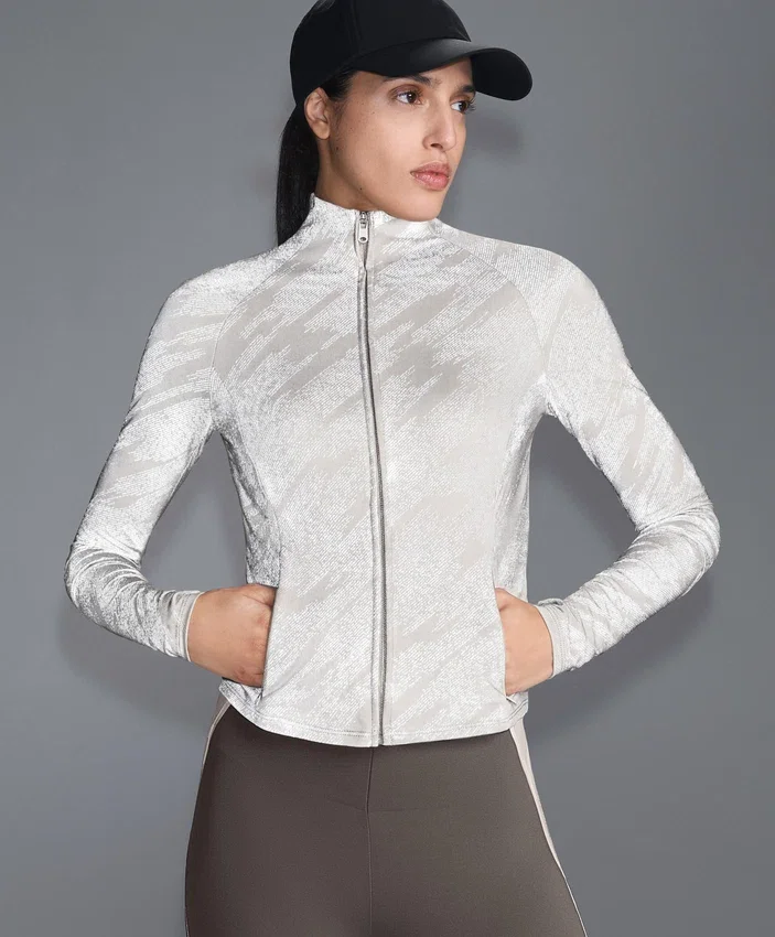Chaqueta técnica ligera, cálida y reflectante Chaqueta técnica ligera, cálida y reflectante