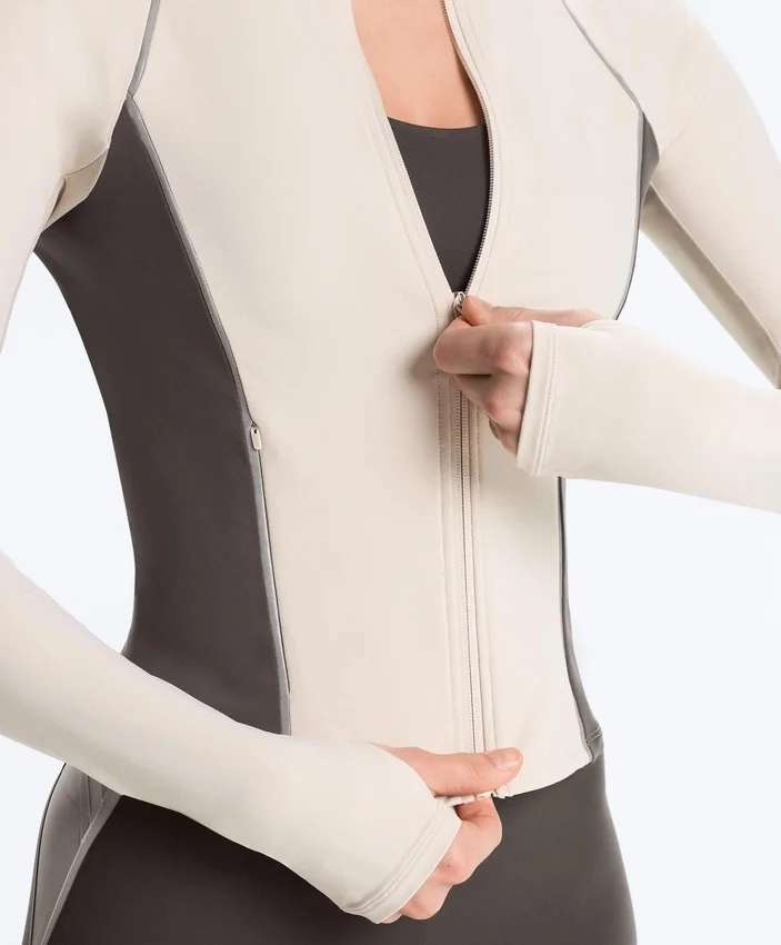 Chaqueta técnica ligera, cálida y reflectante Chaqueta técnica ligera, cálida y reflectante