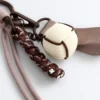 Colgante con forma de pelota de tenis Colgante con forma de pelota de tenis