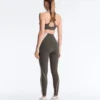 Compressive sports bra with firm support and reflective elements Compressive sports bra with firm support and reflective elements