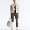 Compressive sports bra with firm support and reflective elements Compressive sports bra with firm support and reflective elements