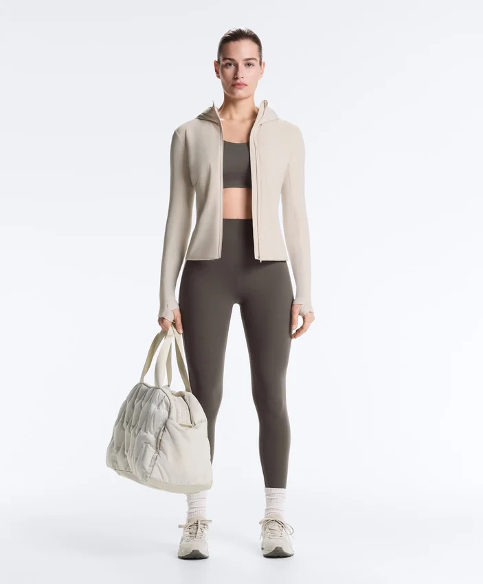 Compressive sports bra with firm support and reflective elements Compressive sports bra with firm support and reflective elements