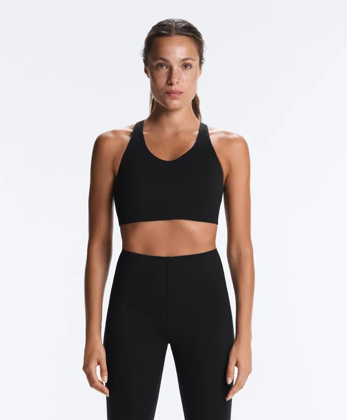 Compressive sports bra with crossed back and firm support Compressive sports bra with crossed back and firm support