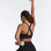 Compressive sports bra with crossed back and firm support Compressive sports bra with crossed back and firm support