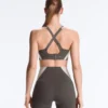 Compressive sports bra with firm support and reflective elements Compressive sports bra with firm support and reflective elements