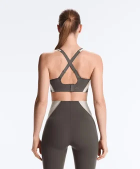 Compressive sports bra with firm support and reflective elements Compressive sports bra with firm support and reflective elements