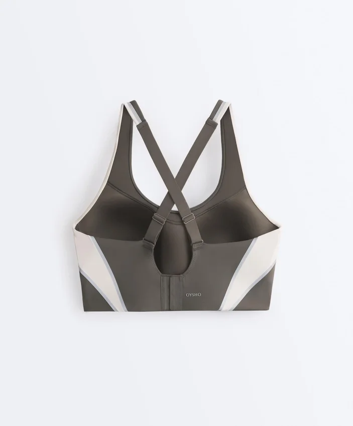 Compressive sports bra with firm support and reflective elements Compressive sports bra with firm support and reflective elements