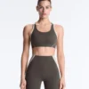 Compressive sports bra with firm support and reflective elements Compressive sports bra with firm support and reflective elements