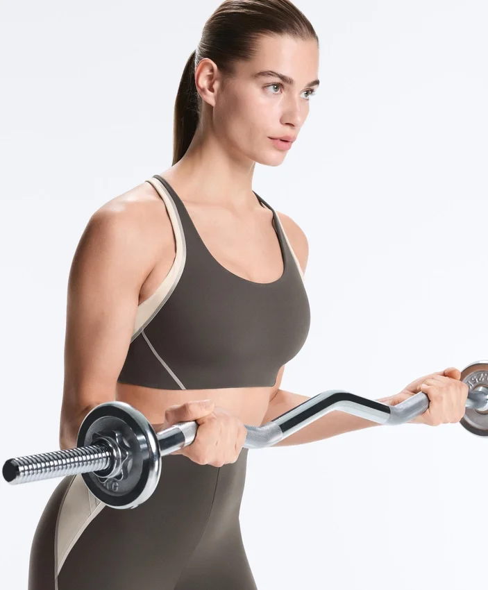 Compressive sports bra with firm support and reflective elements Compressive sports bra with firm support and reflective elements