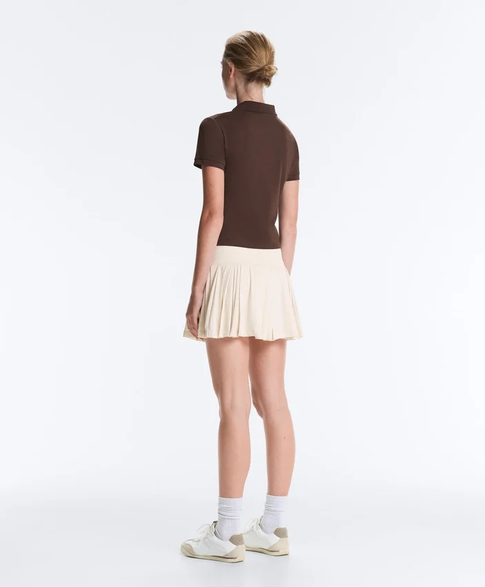 Falda corta plisada sin costuras de talle alto Falda corta plisada sin costuras de talle alto