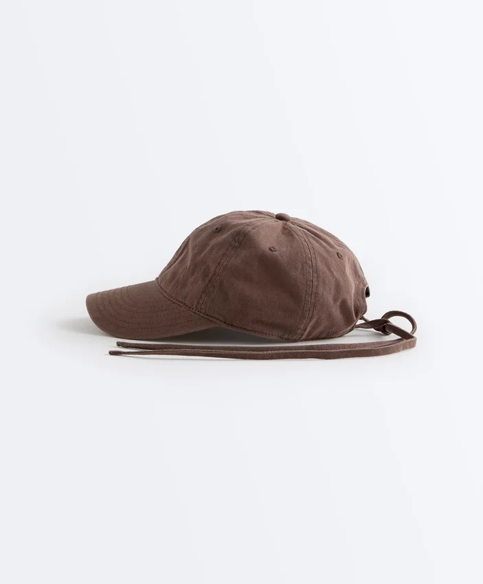 Gorra con efecto lavado 100 % algodón con cordón Gorra con efecto lavado 100 % algodón con cordón