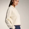 Jerséis de cuello polo con mini trenzas Jerséis de cuello polo con mini trenzas