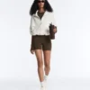 Mono corto con cremallera Comfortlux Mono corto con cremallera Comfortlux