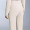 Mono de esquí elástico, resistente al agua, 2 en 1 y con pantalones acampanados desmontables